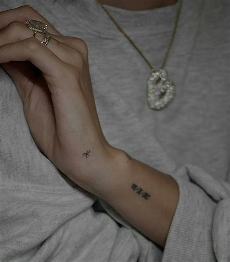 13 Coquette Tattoo Ideas Inspired By Hailey Biebers Dainty Bow