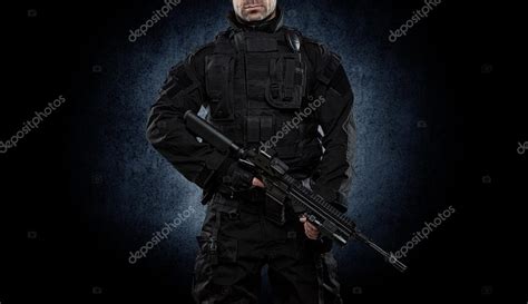 Spec Ops Police Officer Swat In Black Uniform Studio Stock Photo