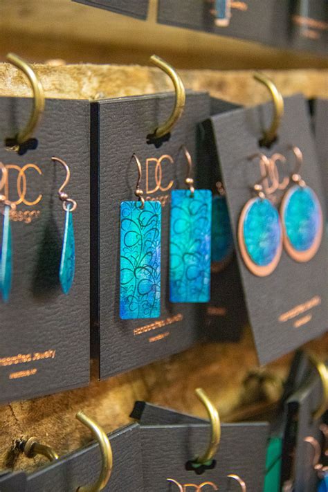 DC Designs Earrings | Jewelry website, Jewelry design, Jewelry