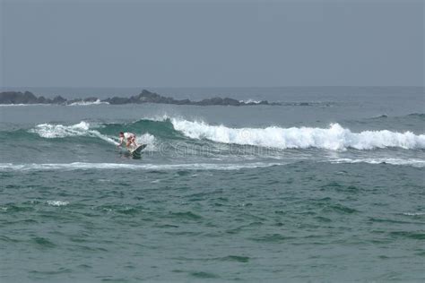 Surfing The Waves Of Koggala Beach In Sri Lanka Editorial Photo Image