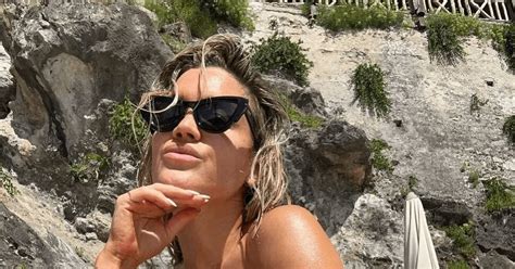 In A Tiny Bikini Ashley Roberts Risks Wardrobe Disaster Due To Fans Incapacitation