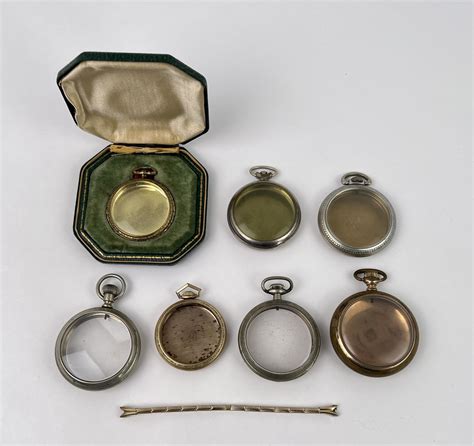 At Auction: ANTIQUE POCKET WATCH CASES