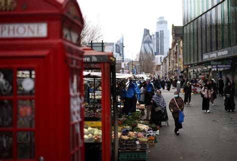 UK economy shows zero Q4 growth, narrowly avoids recession | Reuters