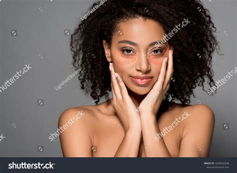 Naked African American Girl Hydrogel Eye Stock Photo