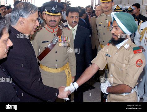 Pakistan S Prime Minister Shaukat Aziz Second Left Shakes Hands With