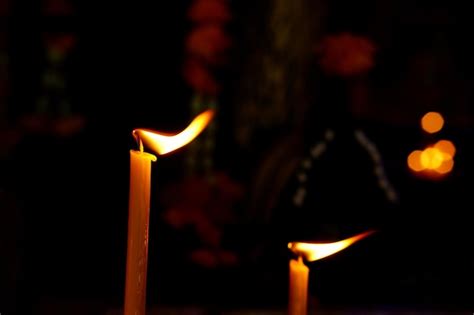 Premium Photo Golden Candle Light In Worship On Buddhist Holy Day