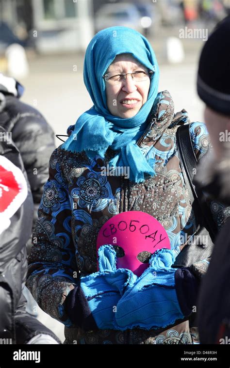 Russian Activist With The Mask Symbol Of Pussy Riot Reads Freedom