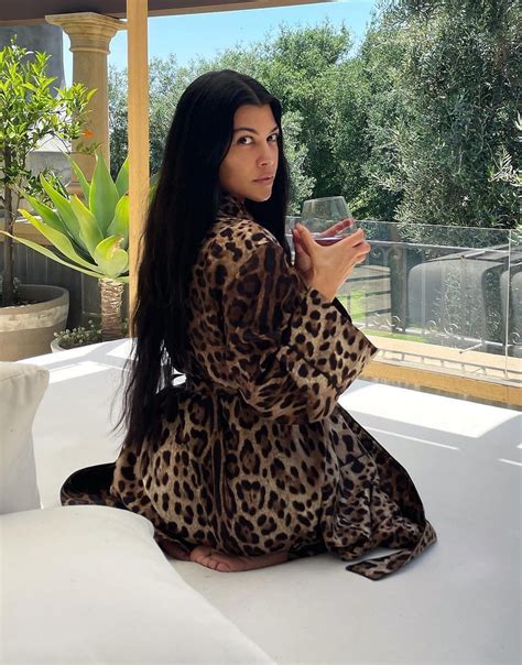 Kourtney Kardashian Goes Pantless In Extremely Short Cotton Robe For New Photo After Relaxing