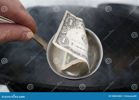 Ladle With Dollar Bill Stock Photo 50863686