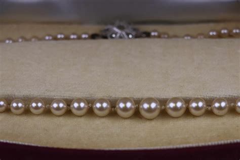 Graduated Lotus Simulated Pearl Necklace With Marcasite Silver Clasp