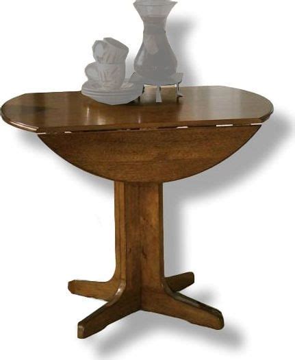 Ashley D293 15 Stuman Series Round Drop Leaf Table Asian Hardwoods And