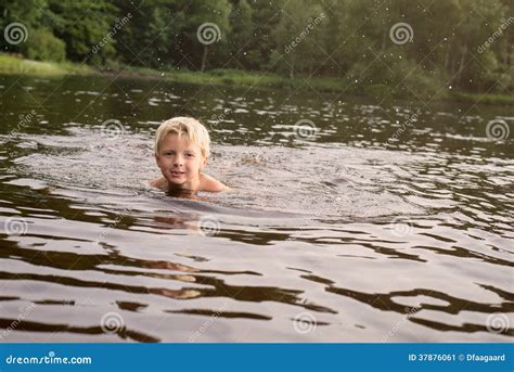 Boy Swimming In A Lake Late Afternoon Stock Image Image Of Water Splash 37876061