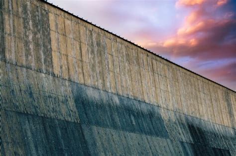 Premium Photo | Cloud over industrial dam photo