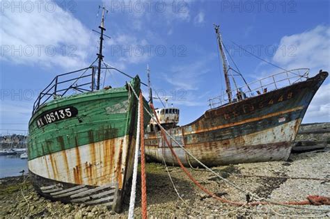 Wrecks Of Trawler Fishing Boats In The Harbour Of Camaret Sur Mer