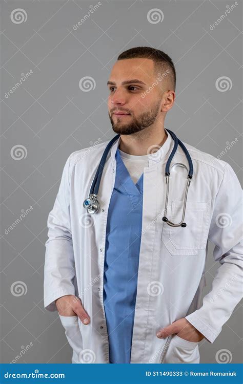 Male Physician In White Coat With Stethoscope Isolated Stock Image