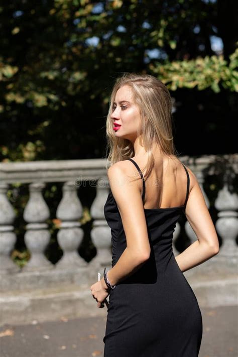 Seductive Blonde Model With Long Hair Wearing Black Dress Posin Stock Image Image Of Beauty