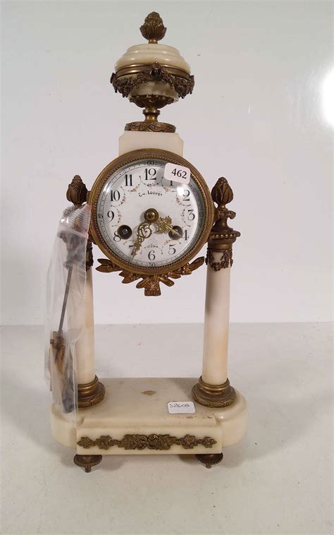 Une Pendule Portique En Marbre Blanc Et Bronze Style Louis Xvi H