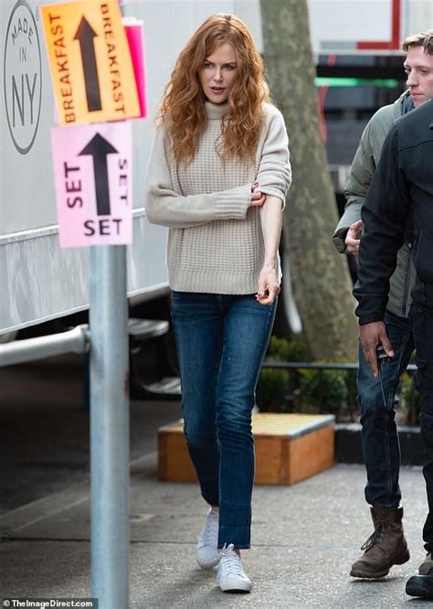 Nicole Kidman Sports Cream Turtleneck And Denim Bottoms While On Set