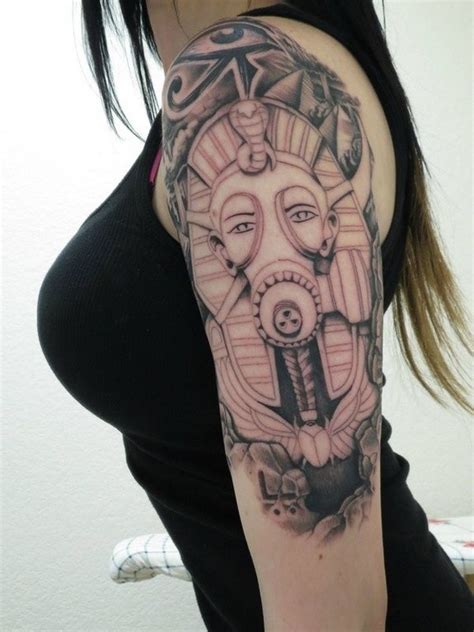 Strange Looking Colored Egypt Pharaoh Statue In Gas Mask Tattoo On