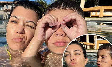Kourtney Kardashian Dons A Neon Yellow Bikini As She And Son Reign Enjoy A Sunny Day At The Pool