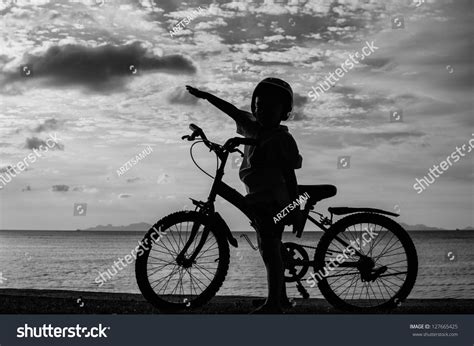 Biker Family Silhouette On Beach Sunset Stock Photo 127665425 ...