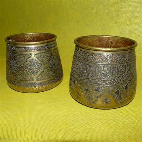 Capital Antiques And Fine Art A Pair Of 19th Century Engraved Brass And Silver Inlaid Vessels