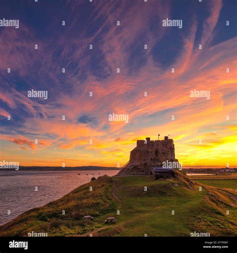 Summer Sunset From Beblow Crag Over Lindisfarne Castle On The Holy