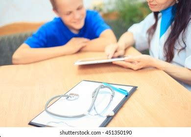 Doctor Talking Her Male Patient Office Stock Photo Shutterstock