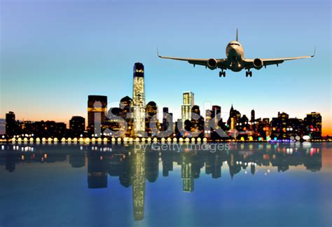 Airplane Fly Above The City Stock Photos Freeimages