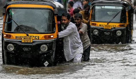 mumbai faces extreme rain red alert issued  city struggles  flooding
