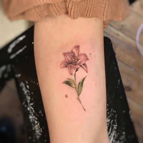 Top 65 Best Lily Tattoo Ideas [2021 Inspiration Guide]