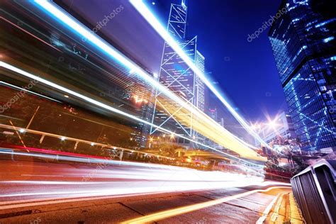 Traffic light trails in modern city street — Stock Photo © zhudifeng ...