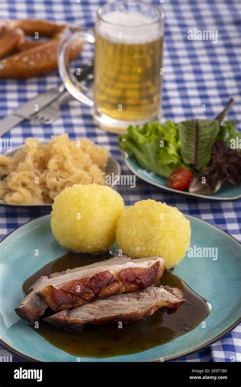 Bayerischer Schweinebraten Mit Kartoffelknodel Hi Res Stock Photography