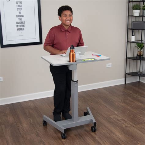 luxor pneumatic adjustable mobile student sit stand desk ergo