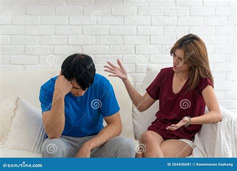 Unhappy Couples Home Handsome Man And Beautiful Young Woman Having