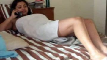 Granny Dirty Talks On The Phone While Playing With Her Pussy