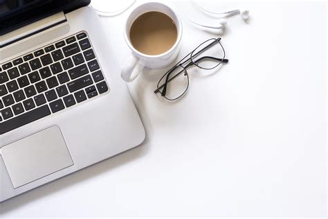 Laptop on desk with coffee - StockFreedom - Premium Stock Photography