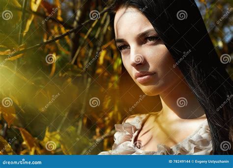 lifestyle outdoor fashion photo  young beautiful woman stock photo