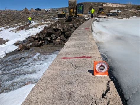 Water Pouring Out Of Rural Utah Dam Through 60 Foot Crack Putting