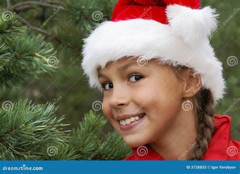 Jolie Fille Dans Le Chapeau De Santa Image Stock Image Du Femelle