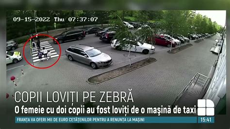 O femeie şi doi copii loviţi de un taxi în timp ce traversau strada