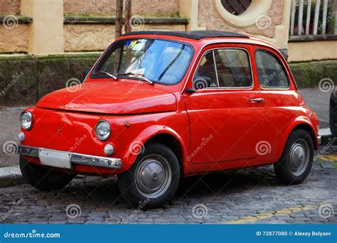 Funny Red Small Old Little Italian Car With Round Headlights And Stock