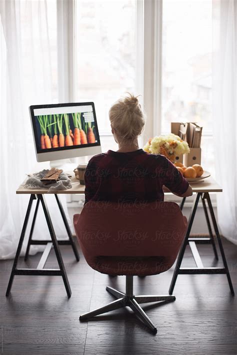 Woman Working At Her Office Del Colaborador De Stocksy Lumina Stocksy