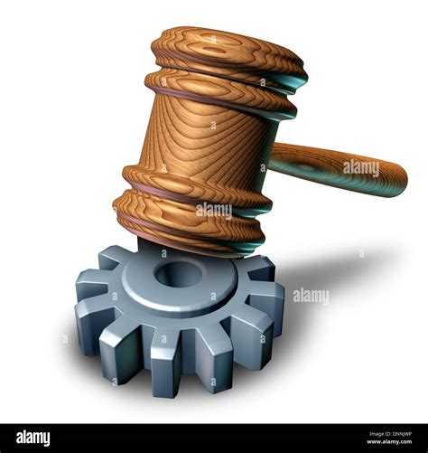 Business law concept with a judge mallet or judges wooden gavel hammering a metal gear or cog ...