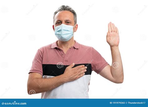 Oath Or Vow Gesture Made By Man Wearing Medical Mask Stock Image