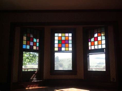 There Are Breathtaking Views From This Wonderfully Preserved Stained Glass Bay Window Trio