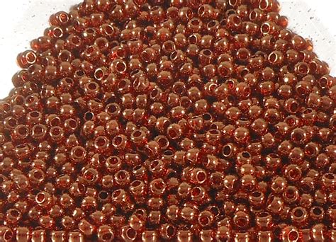 110 Toho Gold Lustered African Sunset Bead Harbor