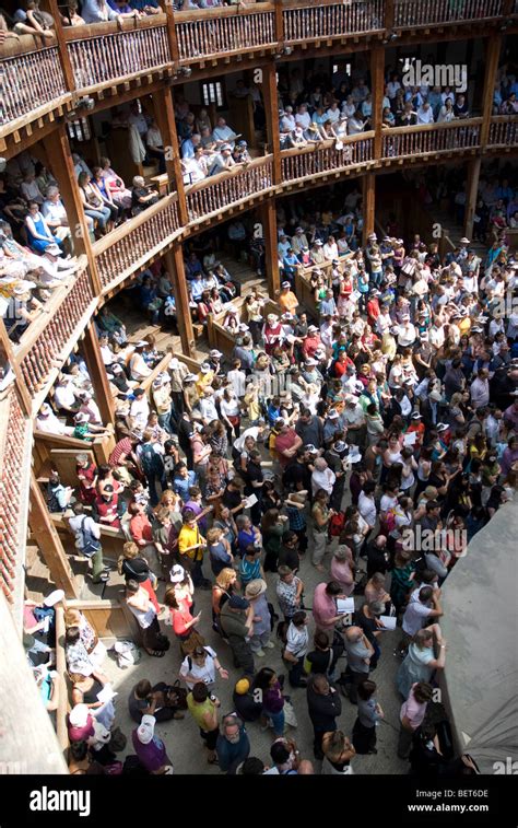 Audience watching a production at the Globe Theatre, Southbank London ...