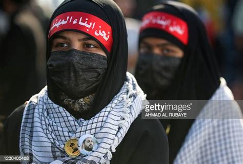 Iraqi Girls Wearing Headbands Bearing The Slogan We Are The Children