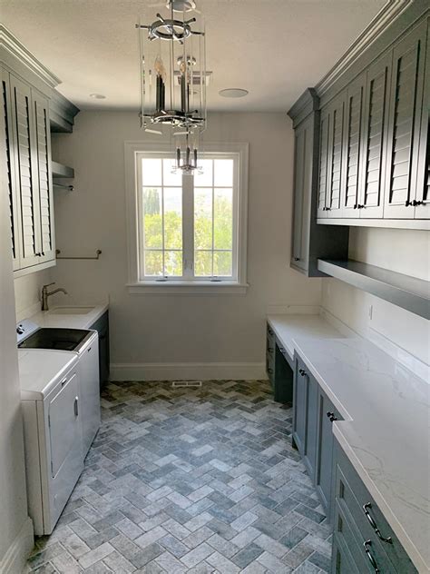 Laundry Mudroom With Herringbone Brick Floor Remington Avenue